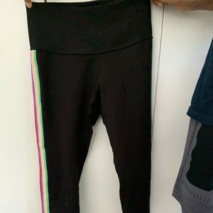 Black leggings with rainbow stripes